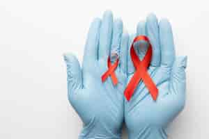 Free photo person holding an world aids day ribbon