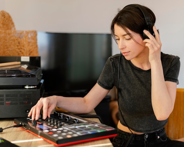 Person making music indoors