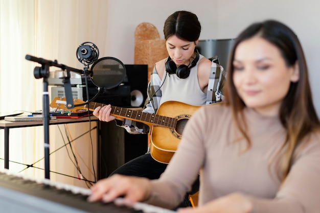 Person making music indoors