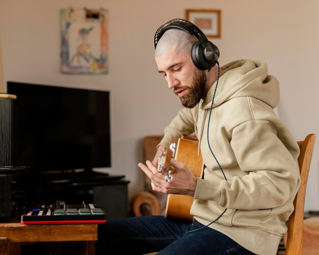 Person making music indoors