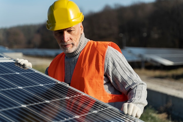 Person near alternative energy plant