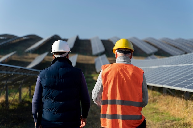 Person near alternative energy plant