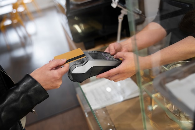 Person paying using nfc technology