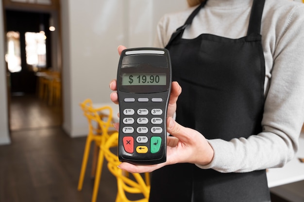 Person paying using nfc technology