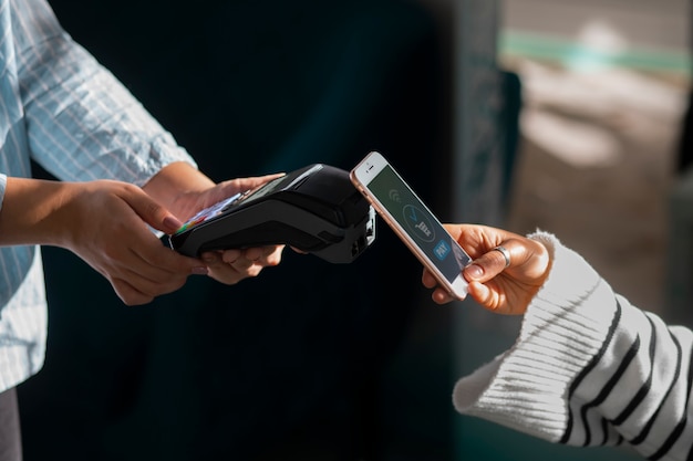 Free Photo person paying with nfc technology at a restaurant