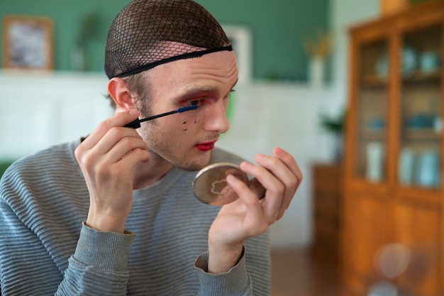 Free photo person preparing their drag outfit