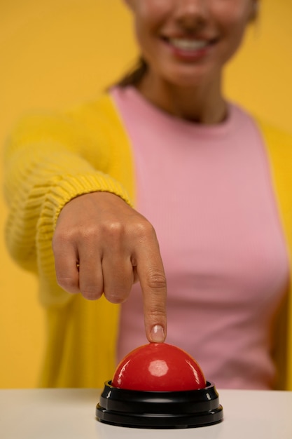 Free Photo person pressing a buzzer