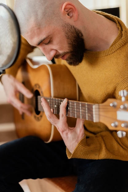 Person producing music at home