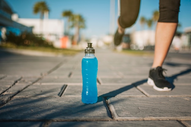 Person running at blue drink