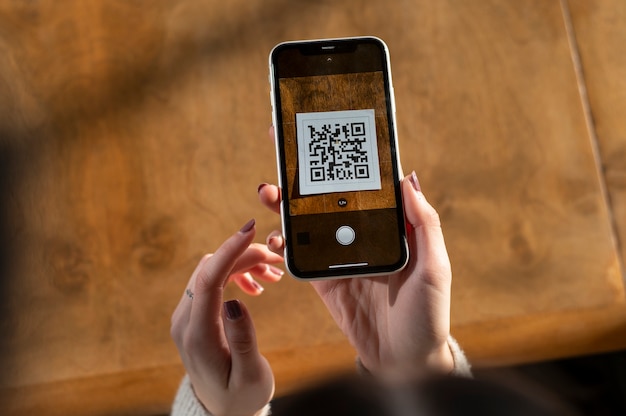 Person scanning qr code