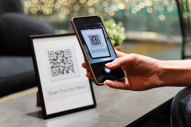 Person scanning qr code