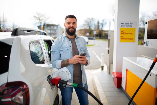 Person spending time at the gas station