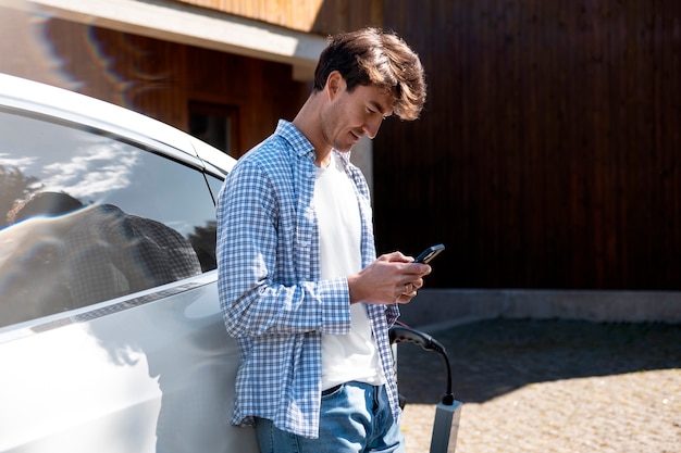 Person taking care of electric car