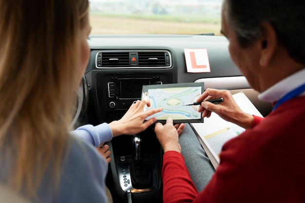 Free photo person taking driver's license exam