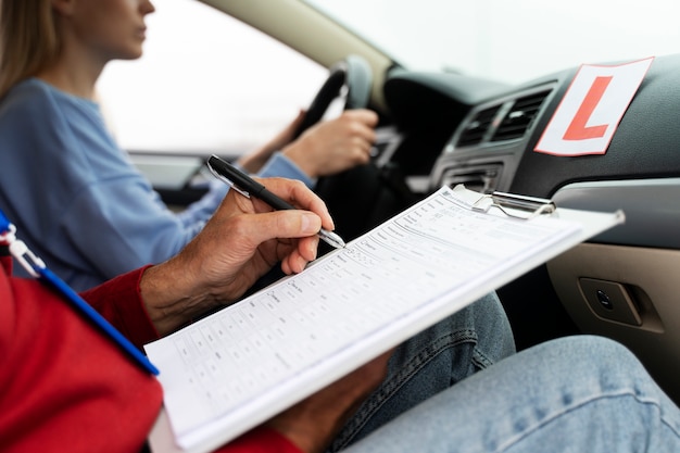 Free photo person taking driver's license exam