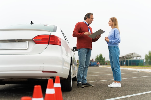 Free photo person taking driver's license exam