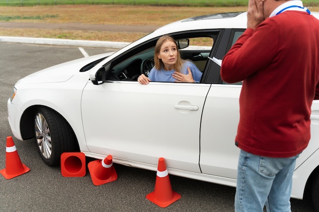 Free photo person taking driver's license exam