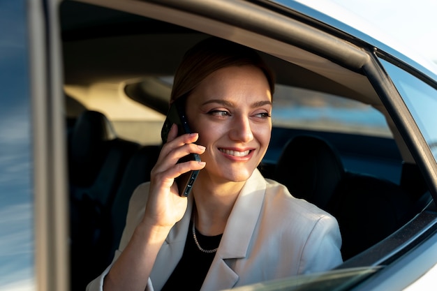 Free photo person traveling by electric car