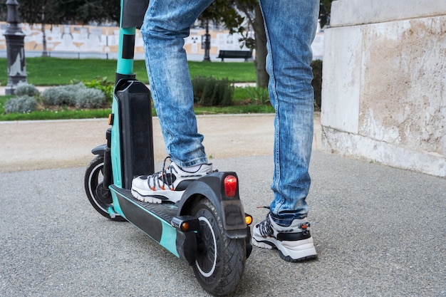 Person using electric scooter in the city