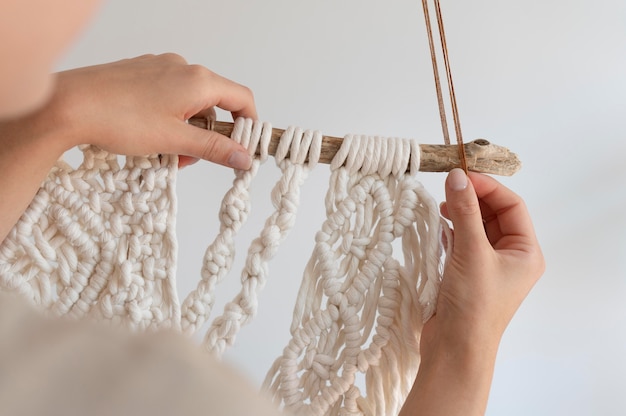 Free Photo person using the macrame technique indoors