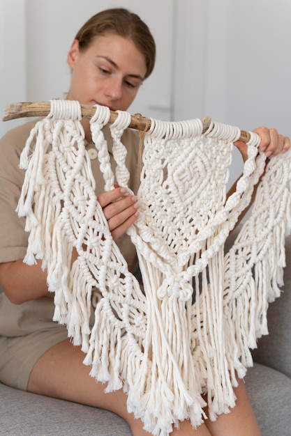 Free Photo person using the macrame technique indoors