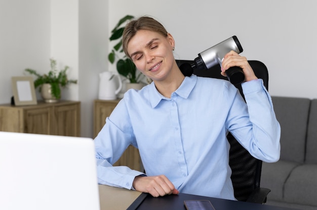 Person using massage gun