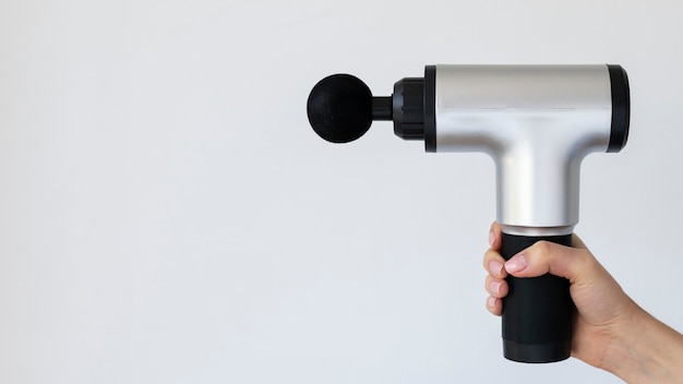 Person using massage gun