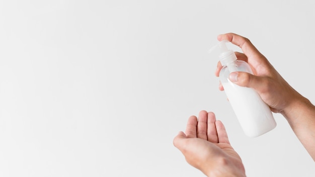 Person washing hands with soap