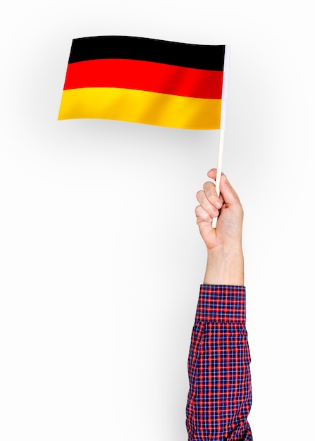 Person waving the flag of Federal Republic of Germany