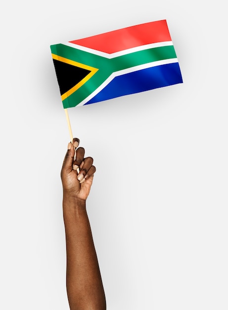 Free photo person waving the flag of republic of south africa