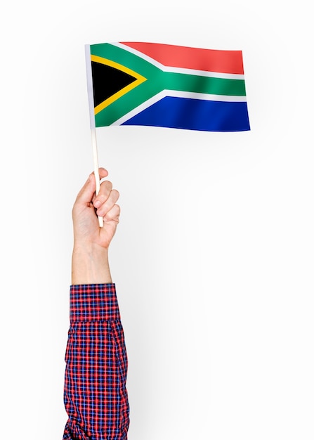 Person waving the flag of Republic of South Africa