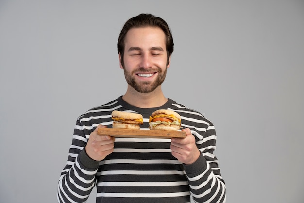 Person with eating disorder trying to eat fast food