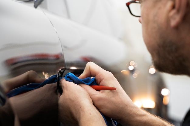 Person working on car wrapping