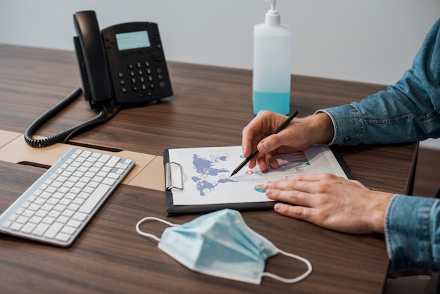 Person working on a clipboard