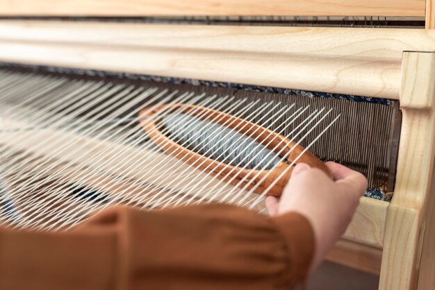 Person working in an embroidery workshop