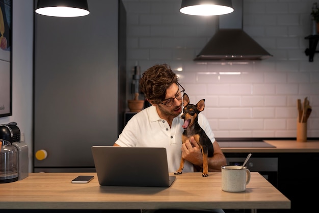 Free Photo person working from home with pet dog