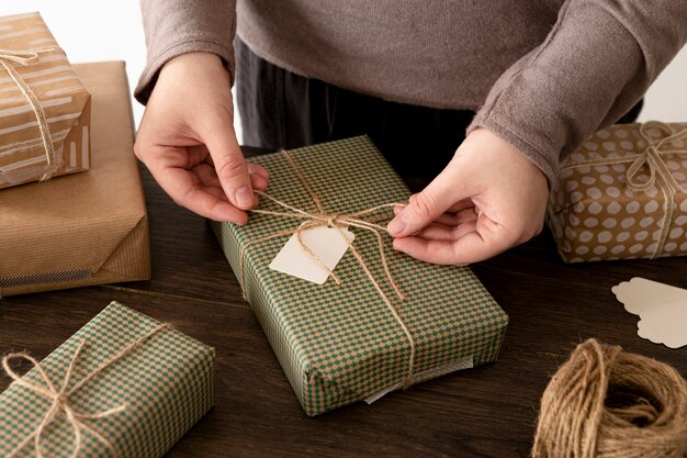 Person wrapping a christmas gift