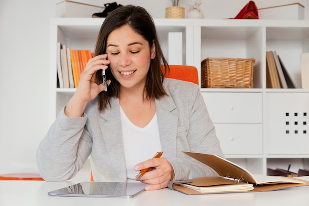 Personal shopper at office talking on mobile