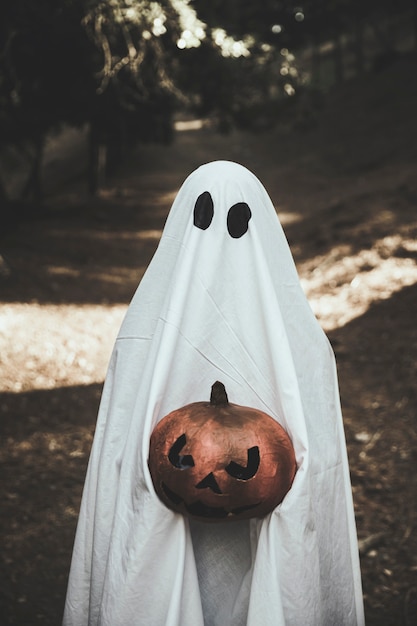 Phantom holding pumpkin in hands