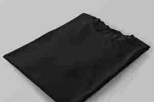 Free photo photo of black tshirt folded with perspective