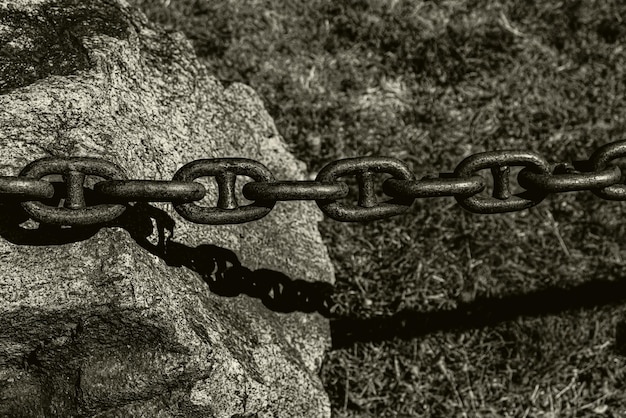 Free Photo photo of chain on stone