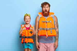 Free photo photo of ginger family ready for the beach