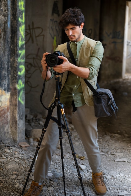 Photographer exploring abandoned location