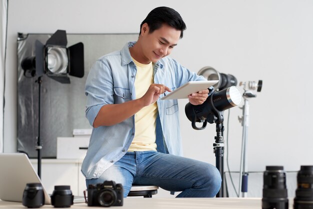 Photographer working in studio