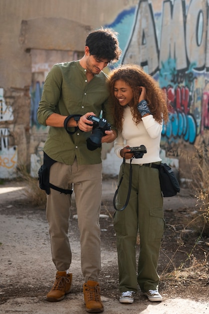 Free Photo photographers exploring abandoned location