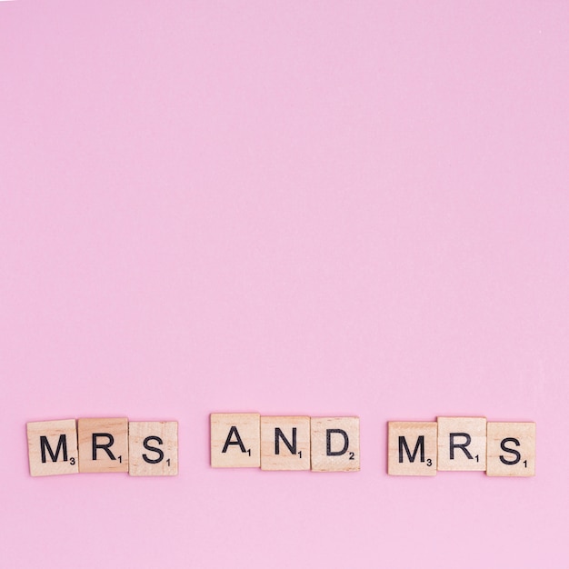 Phrase Mrs and Mrs on wooden squares 