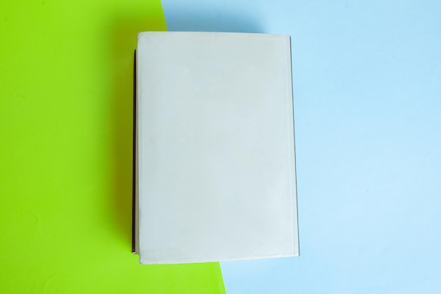 Free photo physical paper book over background closeup