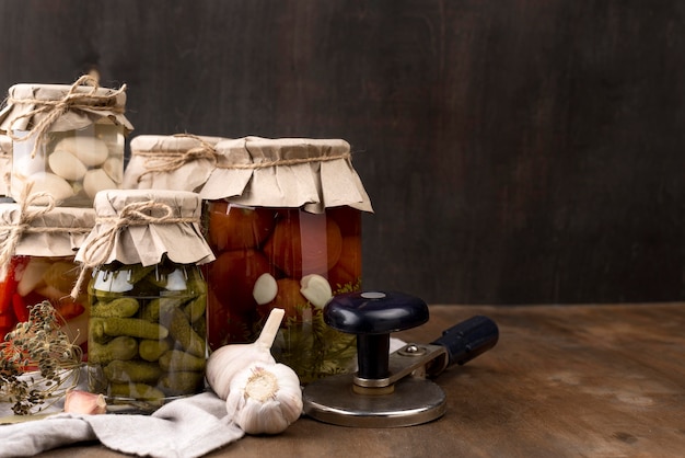 Pickled vegetables in jars arrangement