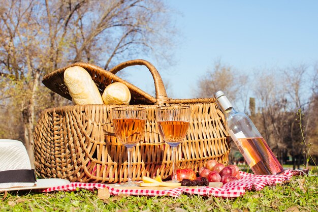 Picnic basket with bottle of white wine