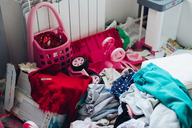 Free photo picture of a girl's children's room with a strong mess